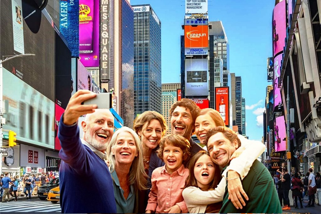 Group of friends and family taking a selfie in Times Square